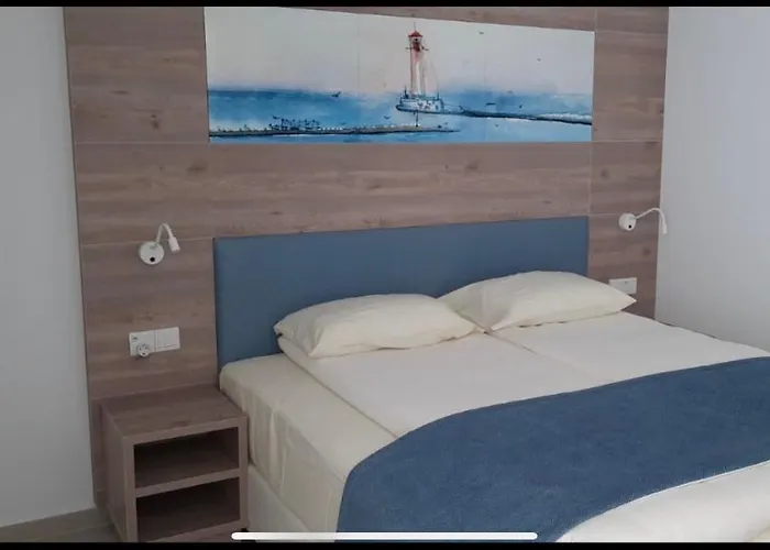 Aparthotel Karousos 4*